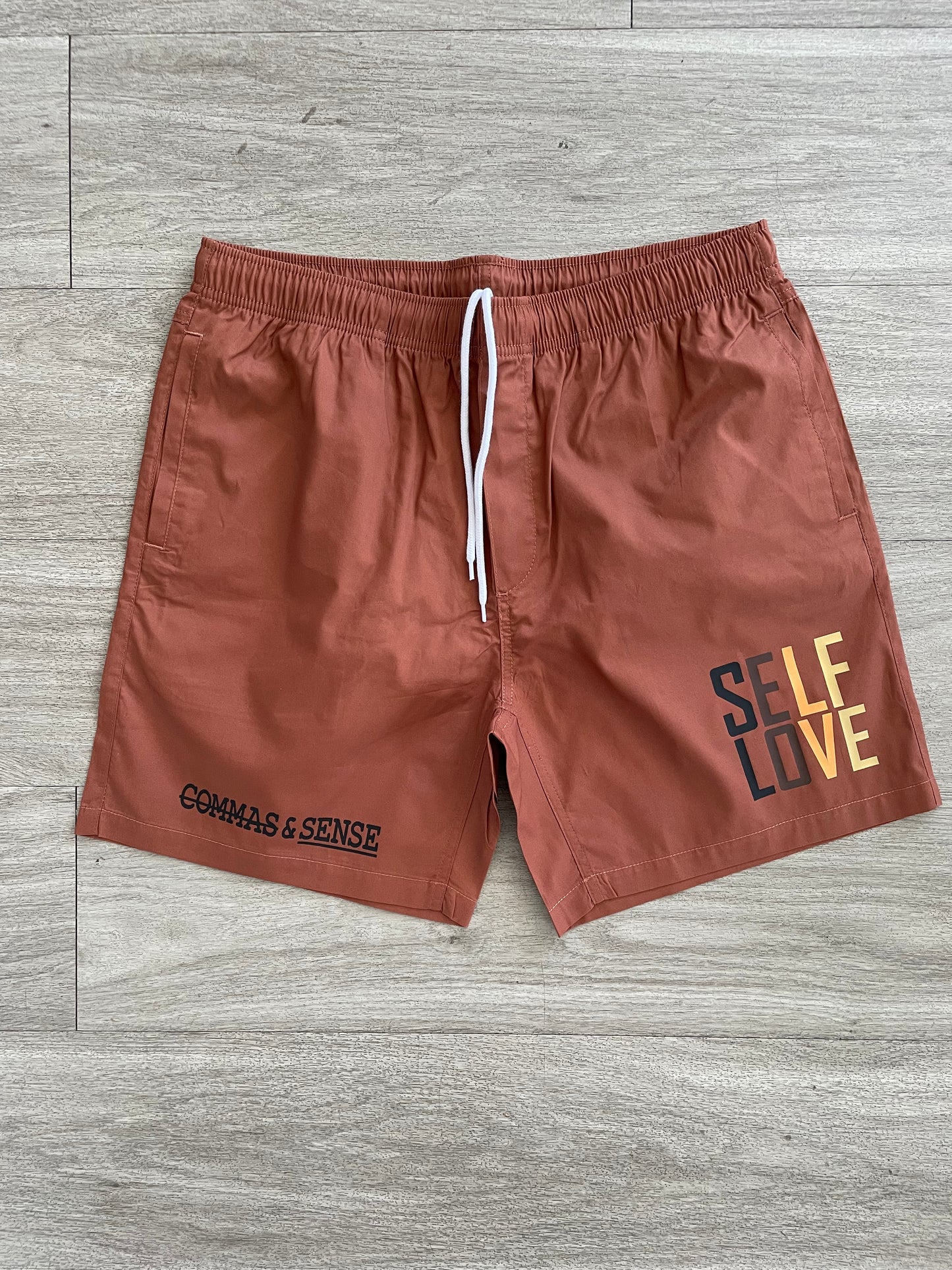 SELF LOVE 'CROWNED COLLECTION' BEACH SHORTS